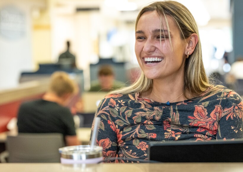 A student smiling