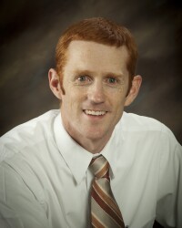 Portrait photo of Travis Ricks.