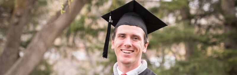 Ryan Chase in the gardens prior to graduation.