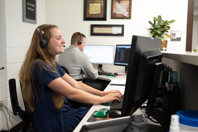 Student employees working in the Scheduling Office in Chapman Hall