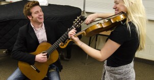 A member of the Shanghai String Quartet working with student ensembles.