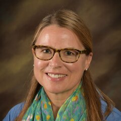 A professional photo of Faculty Sharon Duque.