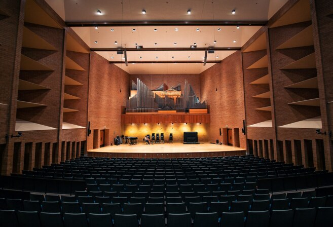 Straight view of the Barrus Concert Hall stage from audience seats.