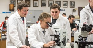Students work in Brother Griffith's Microbiology Lab.