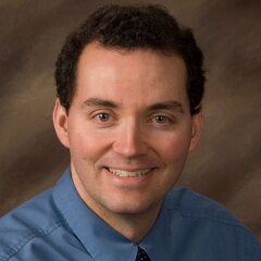 A portrait photo of Mark Bennion