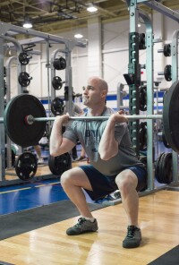 Biology Instructor Joseph Anderson training in the BYU-Idaho Fitness Center.