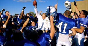 Coach Haun celebrating with the Ricks College football team in 1998