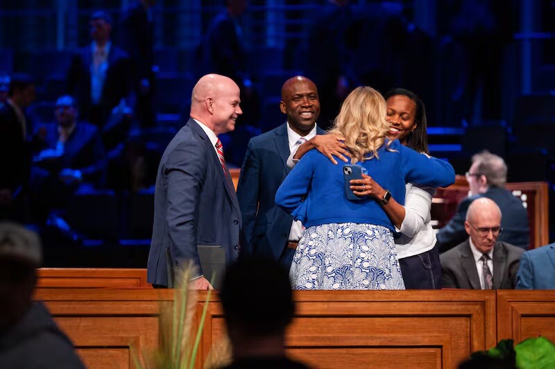 Sister Jennifer Meredith greets Sister Nadine Brown following a BYU–Idaho devotional address by Elder Kevin G. Brown, General Authority Seventy, held in the BYU–I Center in Rexburg, Idaho, Tuesday, May 13, 2025.