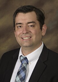 Portrait photo of Jeffrey Thayne.