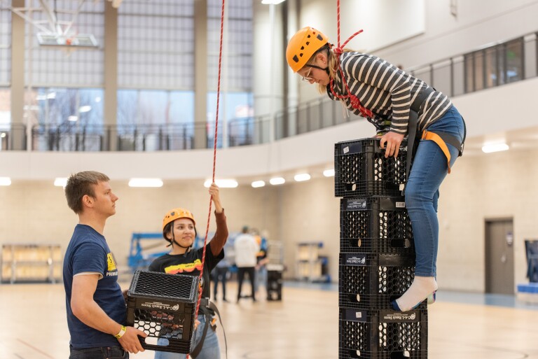 Students participate in crate stacking