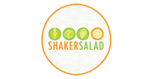 Shaker Salad Logo "SHAKER" written in orange; "SALAD" written in green; 4 small cartoon drawings of vegetables above words; white background with orange outline.