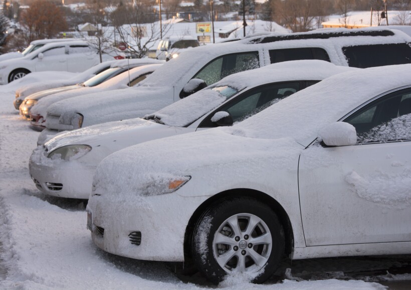Parked Cars with snow on them