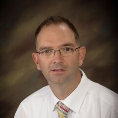 A portrait photo of Quinn Grover