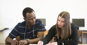 Two students working in the Writing Center