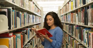 A BYU-Idaho student reads in the McKay Library