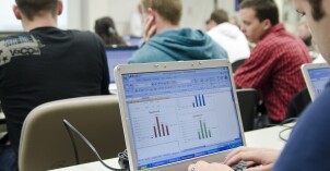 Students work on their computers in a Business Management Class.
