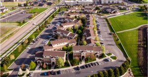 areal view or University Village apartments and parking lots.