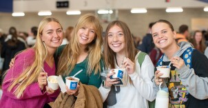 Students and staff gather after Tuesday devotional for an Ice Cream Social for Spirit Week in the I-Center courts.