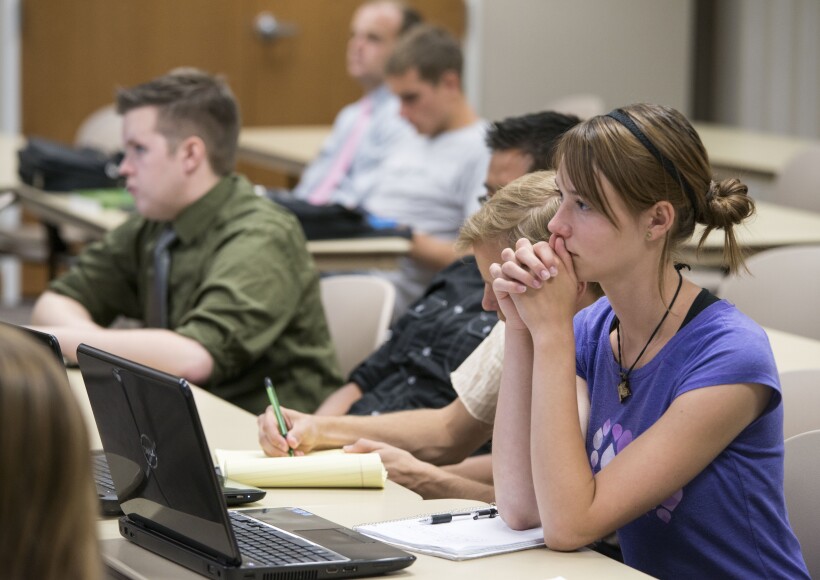 Students in Brother Adamson's Political Science class pay close attention to the material being taught