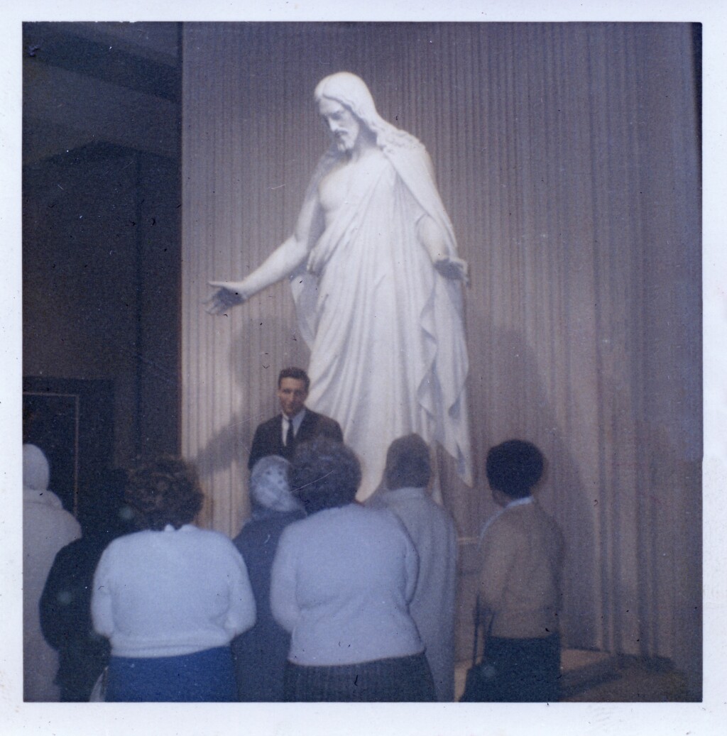 Elder Galovan with Visitors at Christus Statue