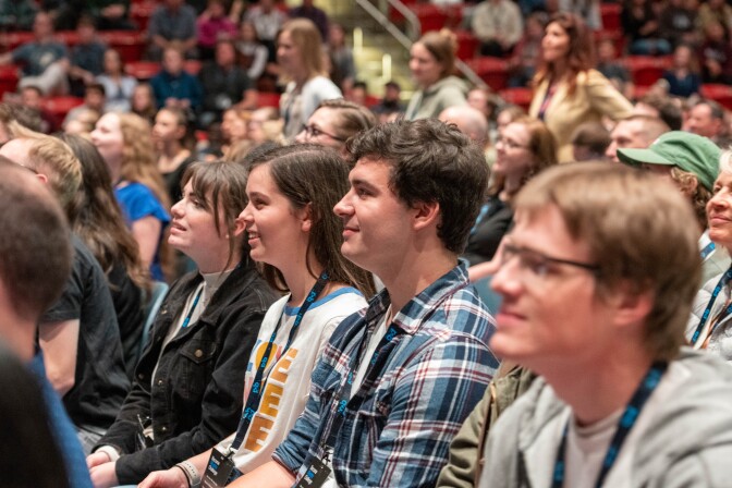 Students sitting listening to a speaker at the P2B conference.