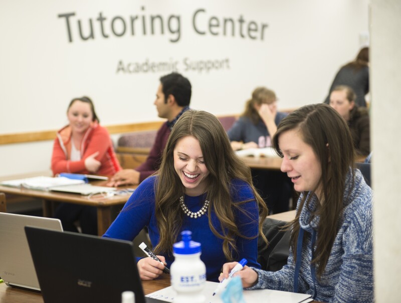 Students sitting in the Tutoring Center