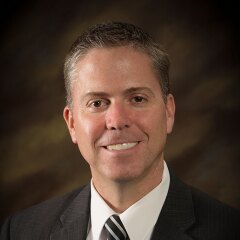 A portrait photo of Jedd Walker