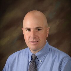 A professional photo of Faculty David Kenneth Belka.
